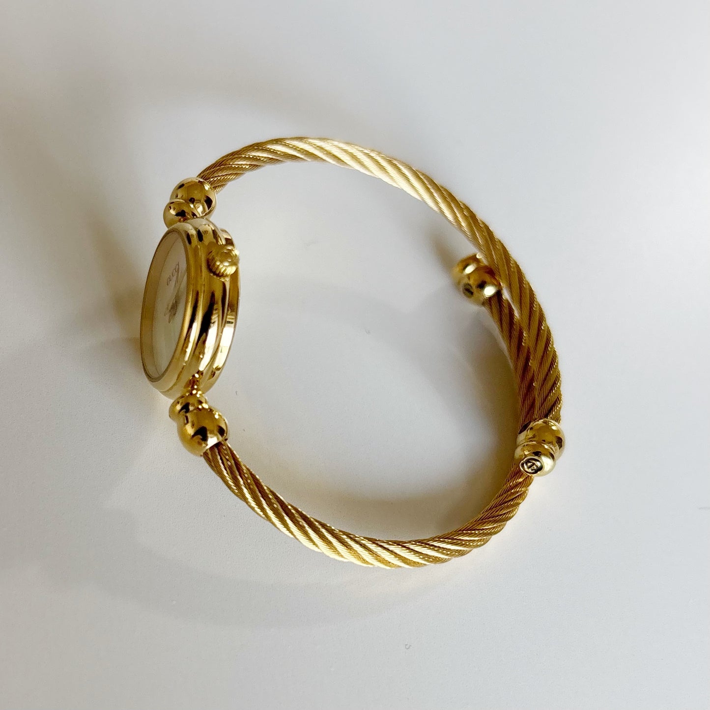 Gucci 1990s Seashell Dial Gold Plated Cable Bangle Watch