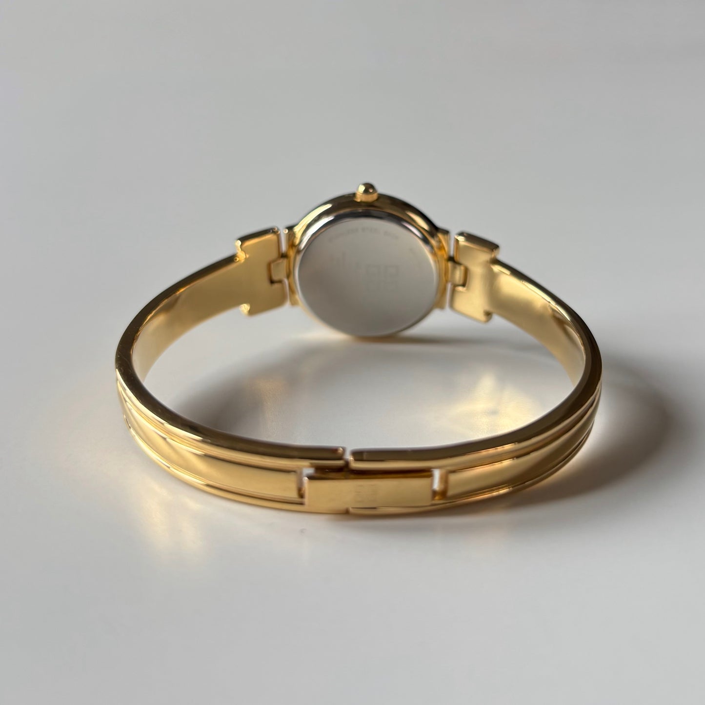 Givenchy 1990s Round Dial Gold Plated Bangle Watch