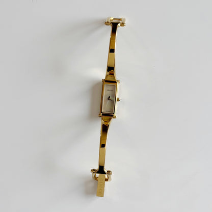 Gucci 1990s Seashell Dial Rectangular Gold Plated Bangle Watch
