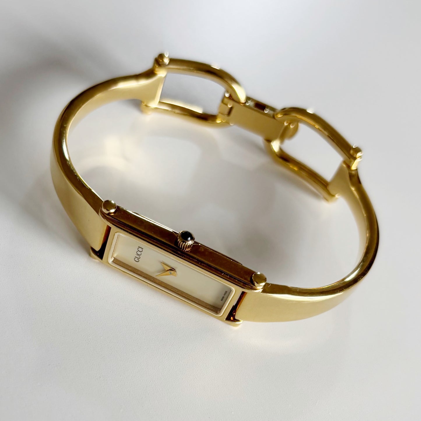 Gucci 1990s Rectangular Seashell Dial Gold Plated Bangle Watch