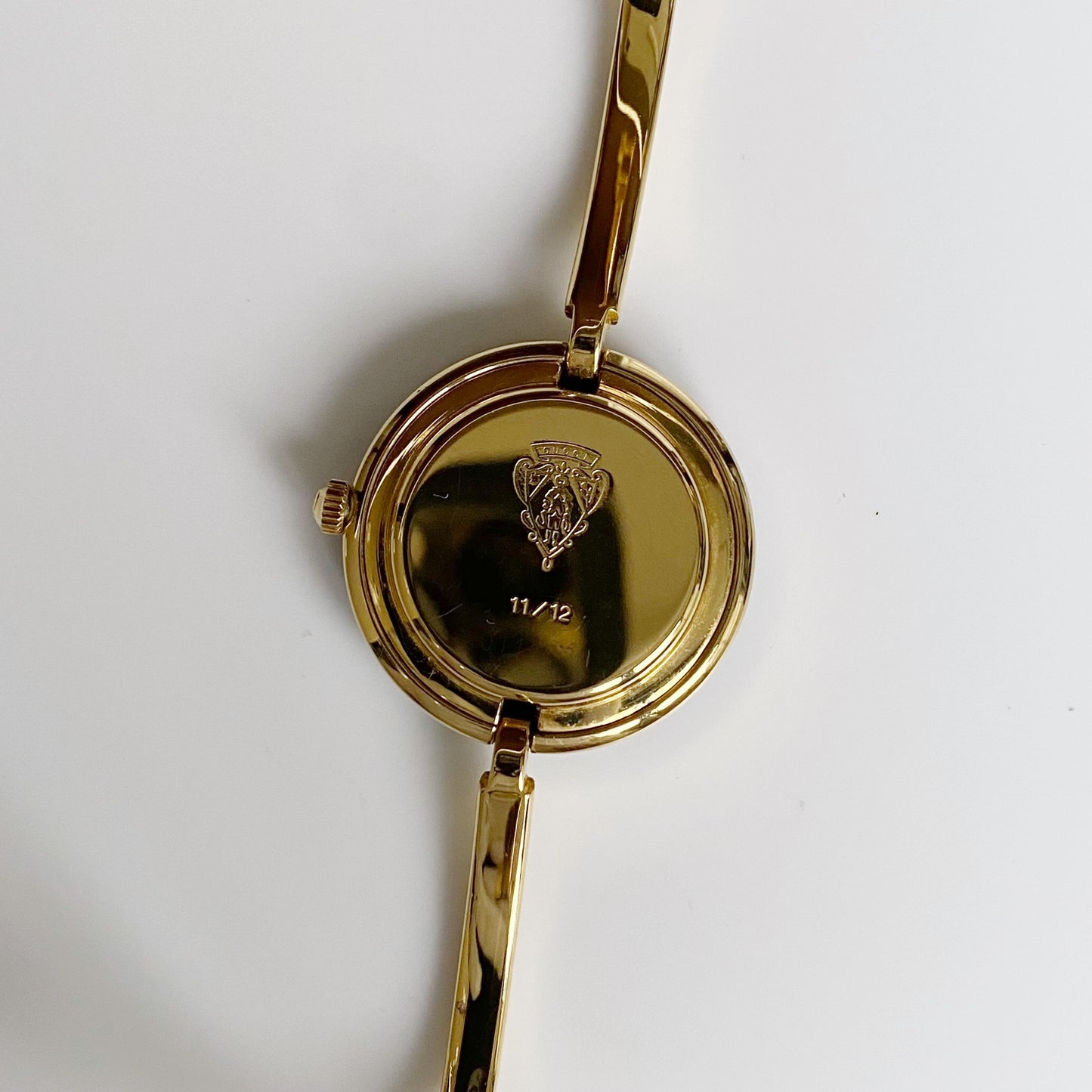 Gucci 1990s Interchangeable Bezel Gold Plated Bangle Watch with 12 bezels, case