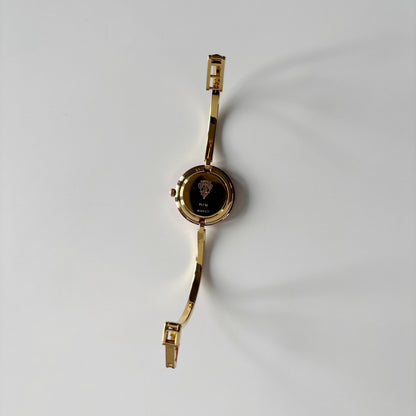 Gucci 1990s Interchangeable Bezel Gold Plated Bangle Watch with 12 bezels, case