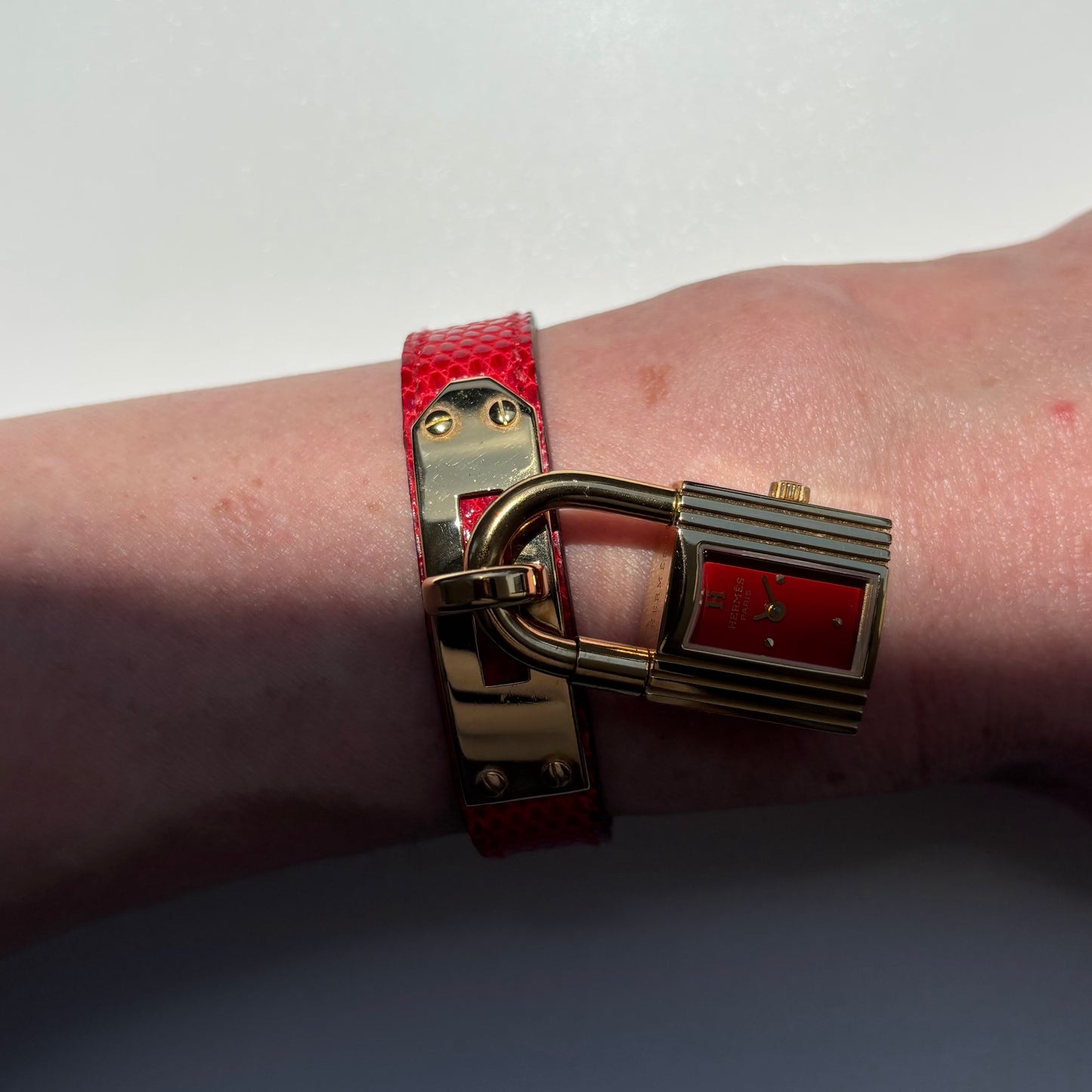 Hermes 1990s Kelly Red Dial Gold Plated Watch