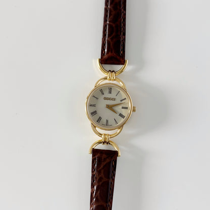 Gucci 1990s Round Dial Gold Plated Horsebit Watch