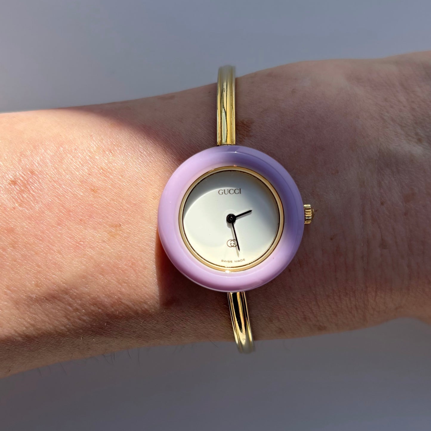Gucci 1990s Interchangeable Bezel Gold Plated Bangle Watch with 12 bezels, case