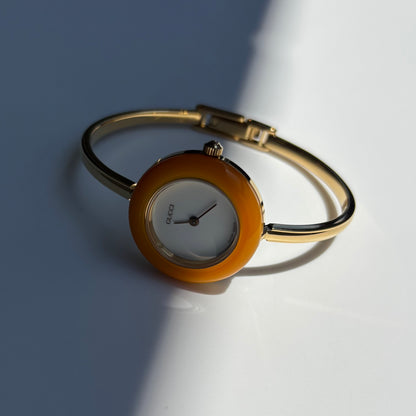 Gucci 1990s Interchangeable Bezel Gold Plated Bangle Watch with 12 bezels, case