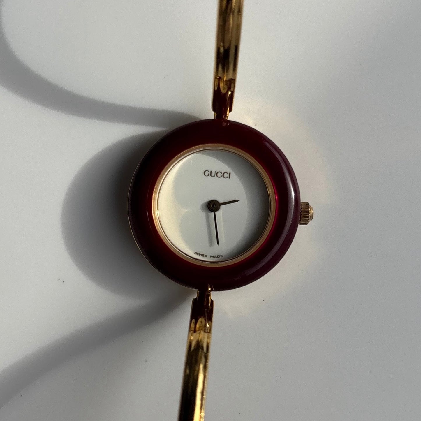 Gucci 1990s Interchangeable Bezel Gold Plated Bangle Watch with 12 bezels, case