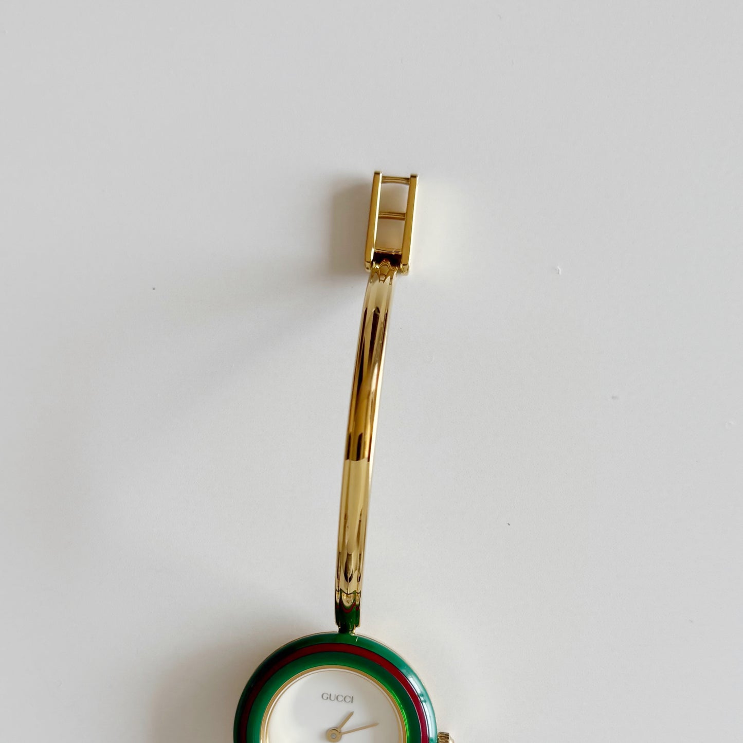 Gucci 1990s Interchangeable Bezel Gold Plated Bangle Watch with 12 bezels, case