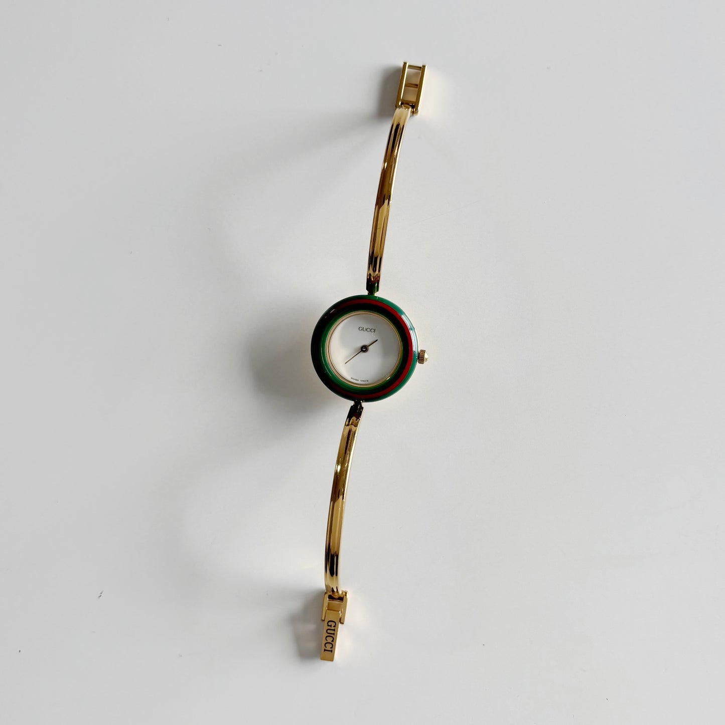 Gucci 1990s Interchangeable Bezel Gold Plated Bangle Watch with 12 bezels, case