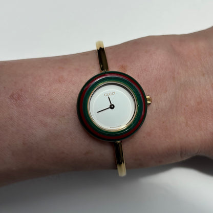 Gucci 1990s Interchangeable Bezel Gold Plated Bangle Watch with 12 bezels, case