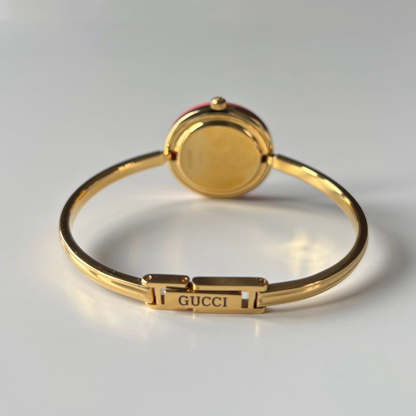 Gucci 1990s Interchangeable Bezel Gold Plated Bangle Watch with 12 bezels, case