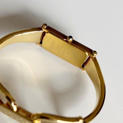 Gucci 1990s Seashell Rectangular Dial Gold Plated Bangle Watch (Small)