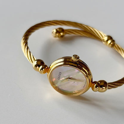 Gucci 1990s Seashell Dial Gold Plated Cable Bangle Watch