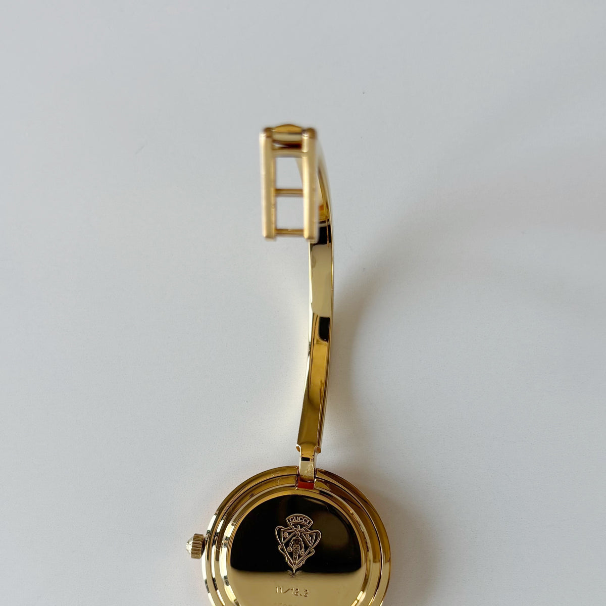 Gucci 1990s Interchangeable Bezel Gold Plated Bangle Watch with 12 bezels, case