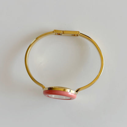 Gucci 1990s Interchangeable Bezel Gold Plated Bangle Watch with 12 bezels, case