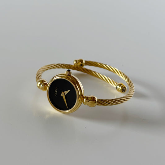 Gucci 1990s Black Dial Gold Plated Cable Bangle Watch