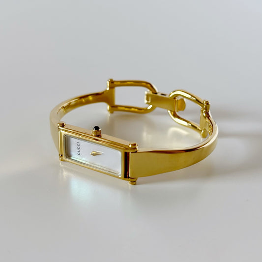 Gucci 1990s Seashell Rectangular Dial Gold Plated Bangle Watch