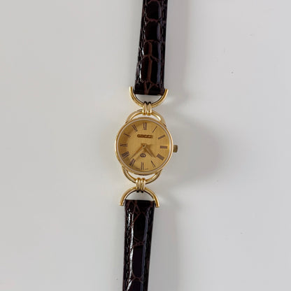 Gucci 1990s Round Dial Horsebit Gold Plated Watch