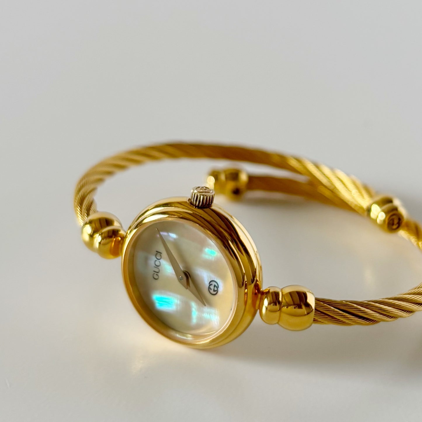 Gucci 1990s Seashell Dial Gold Plated Cable Bangle Watch