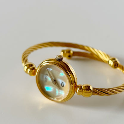 Gucci 1990s Seashell Dial Gold Plated Cable Bangle Watch