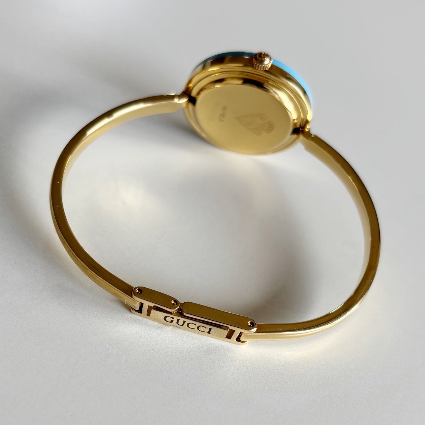 Gucci 1990s Interchangeable Bezel Gold Plated Bangle Watch with 12 bezels, case