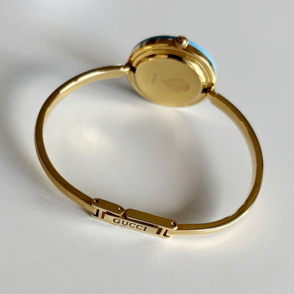 Gucci 1990s Interchangeable Bezel Gold Plated Bangle Watch with 12 bezels, case
