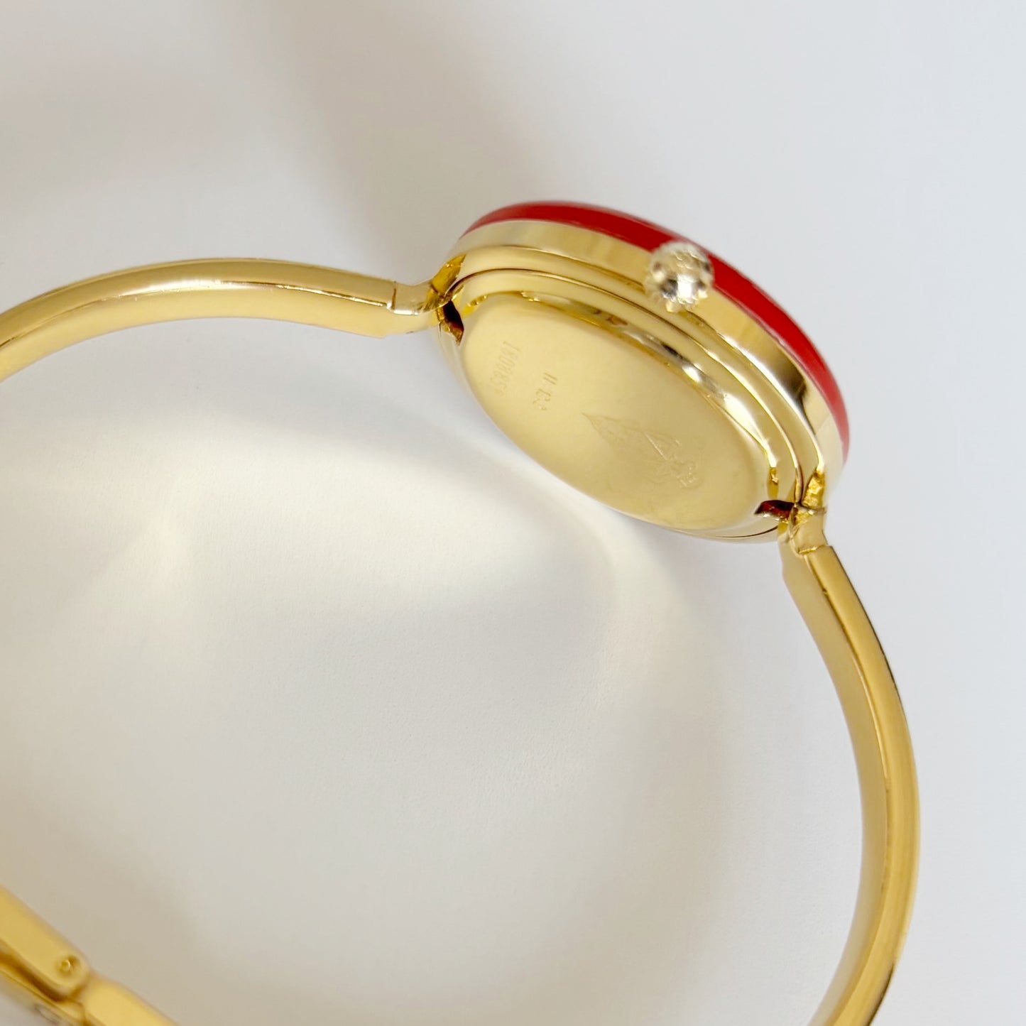 Gucci 1990s Interchangeable Bezel Gold Plated Bangle Watch with 12 bezels, case