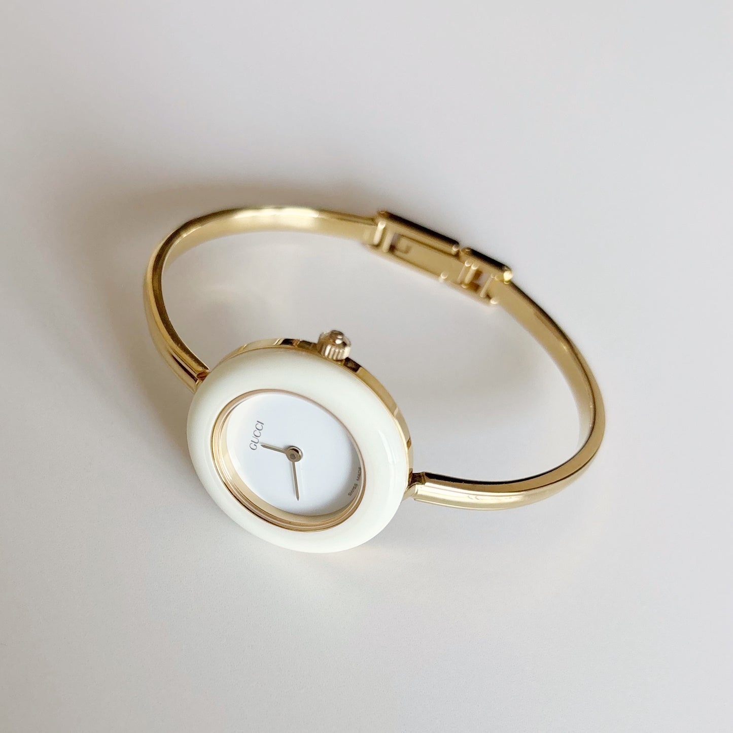 Gucci 1990s Interchangeable Bezel Gold Plated Bangle Watch with 12 bezels, case