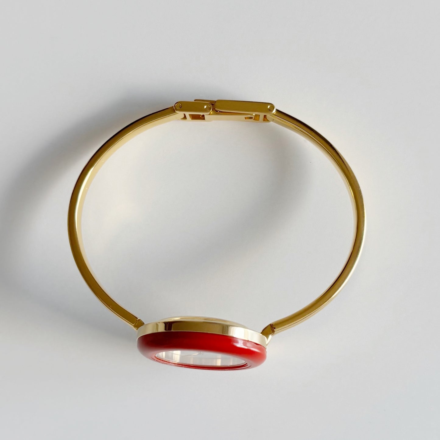 Gucci 1990s Interchangeable Bezel Gold Plated Bangle Watch with 12 bezels, case