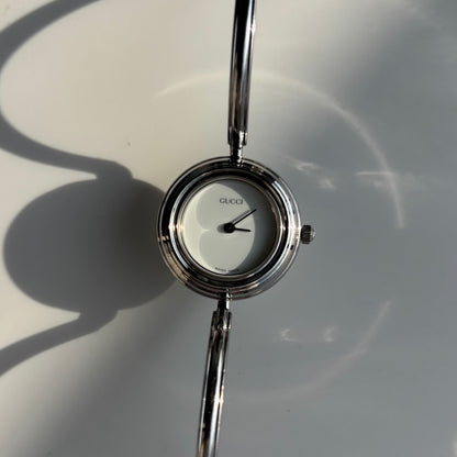 Gucci 1990s Interchangeable Bezel Stainless steel Bangle Watch with 12 bezels, case (Small)