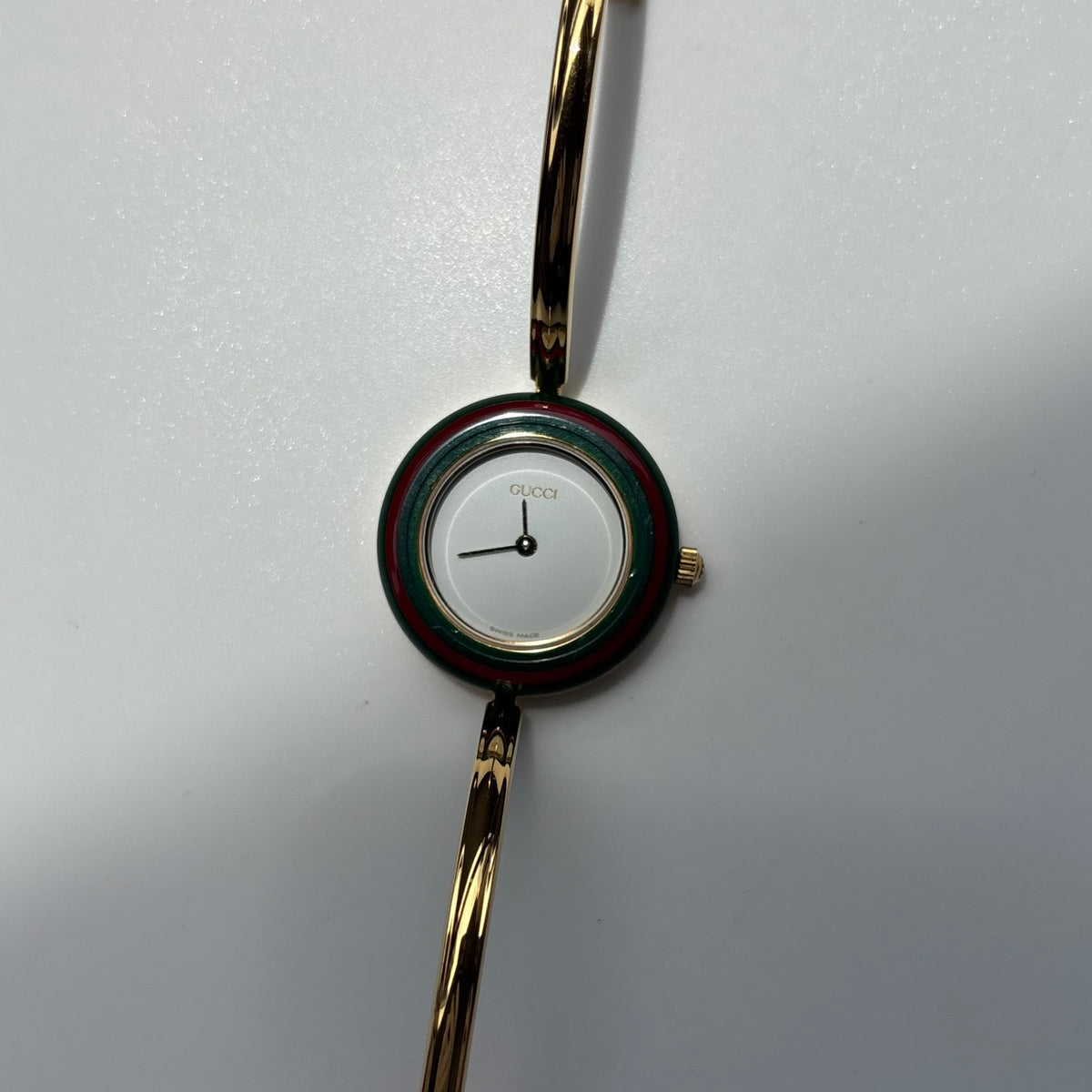 Gucci 1990s Interchangeable Bezel Gold Plated Bangle Watch with 12 bezels, case