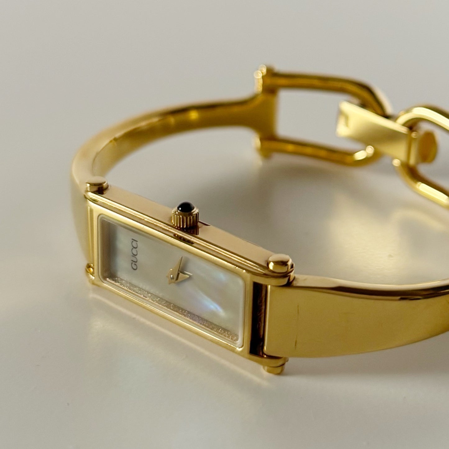Gucci 1990s Seashell Dial Rectangular Gold Plated Bangle Watch