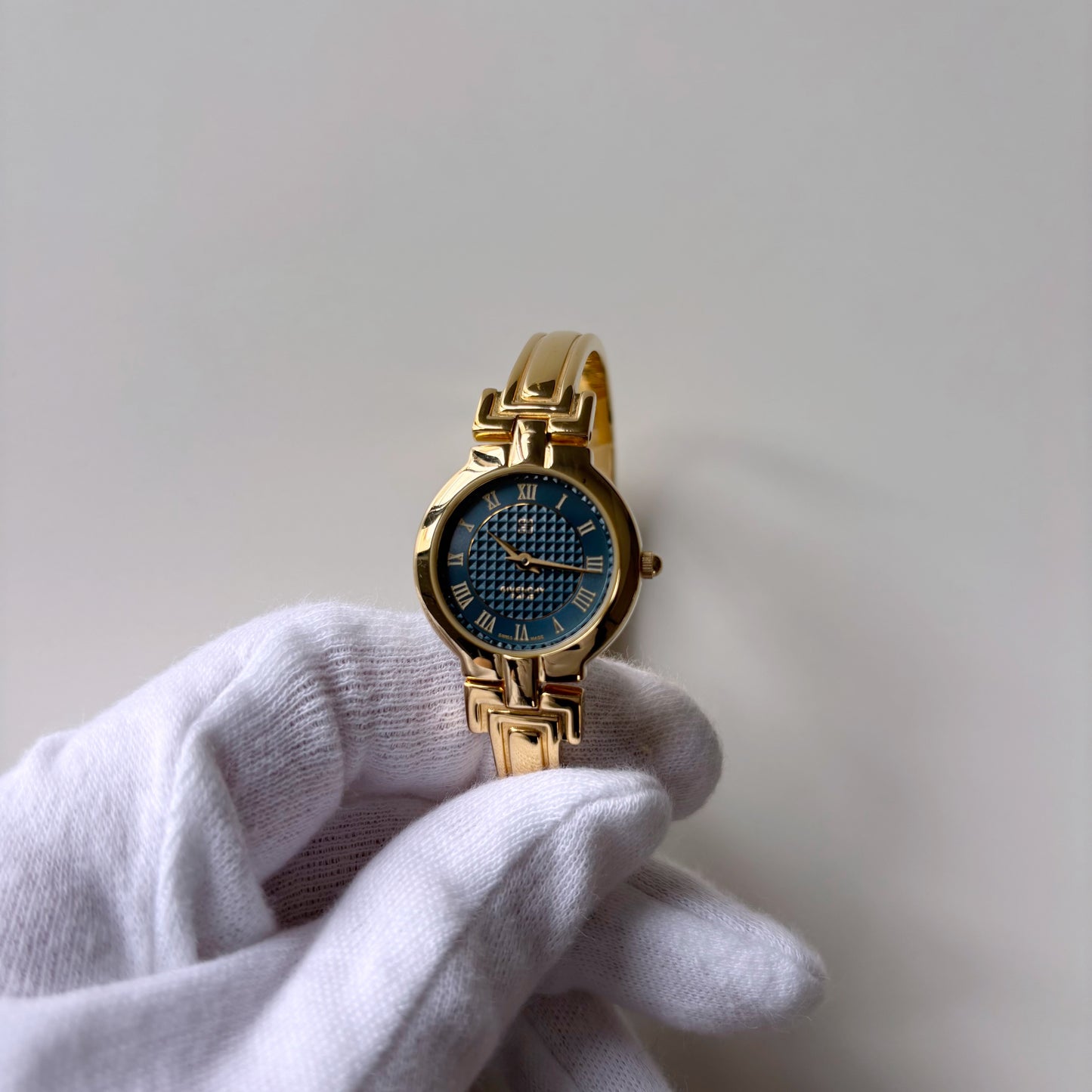 Givenchy 1990s Round Dial Gold Plated Bangle Watch