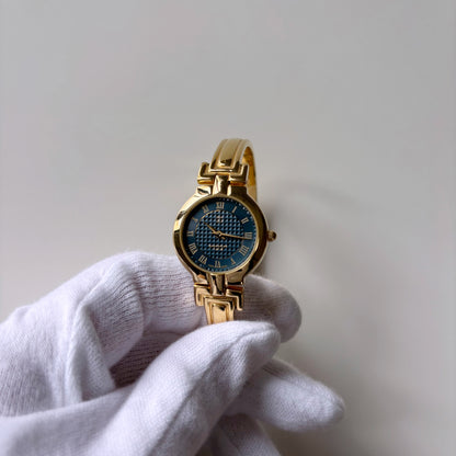 Givenchy 1990s Round Dial Gold Plated Bangle Watch