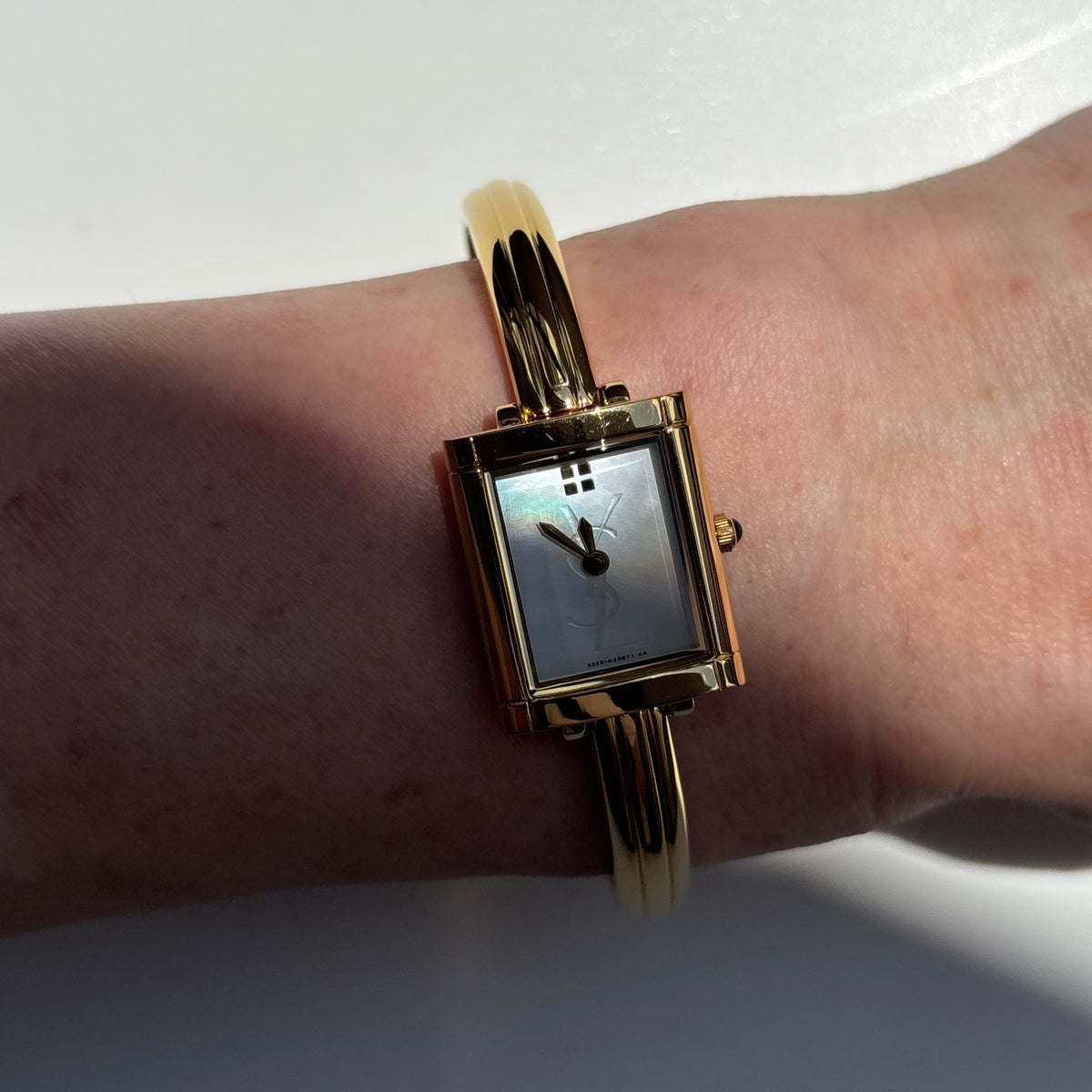 Yves Saint Laurent 1990s Seashell Dial Gold Plated Bangle Watch