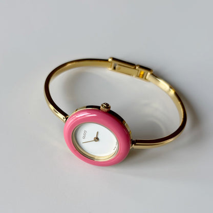 Gucci 1990s Interchangeable Bezel Gold Plated Bangle Watch with case, 12 bezels