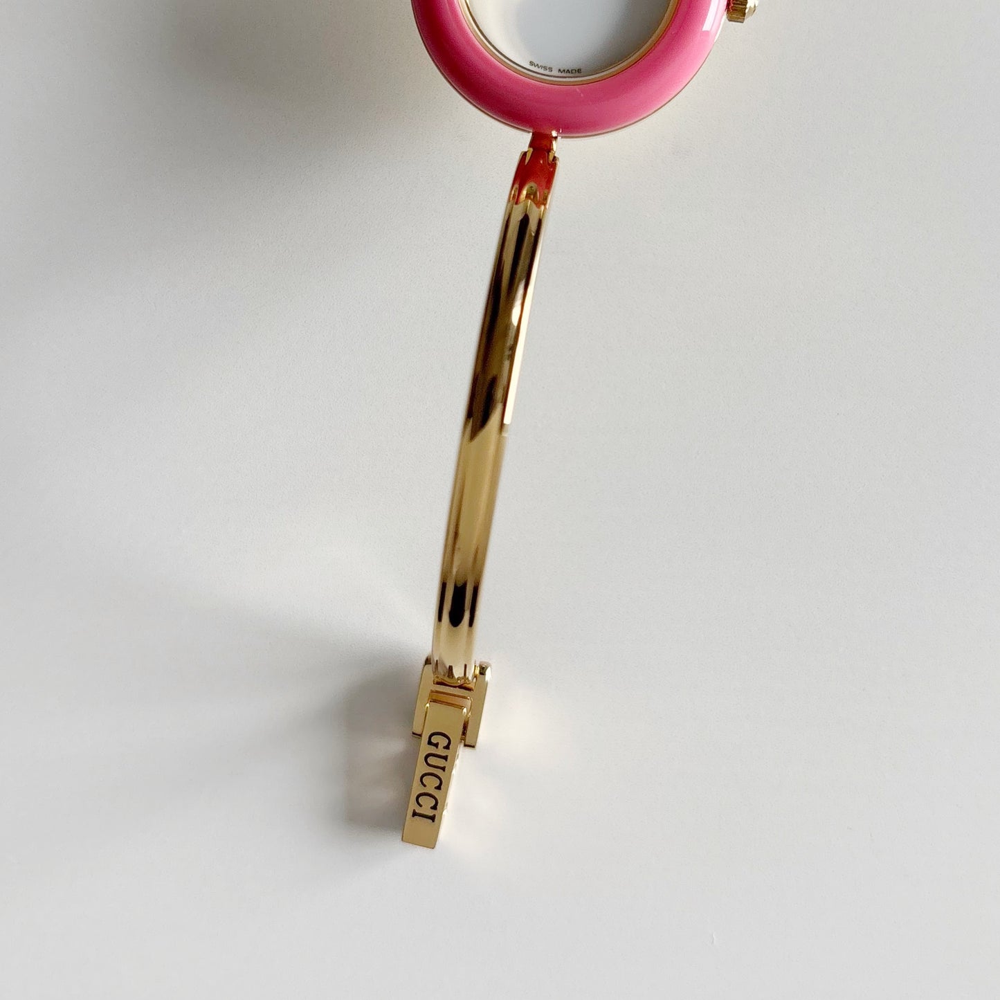 Gucci 1990s Interchangeable Bezel Gold Plated Bangle Watch with 12 bezels, case