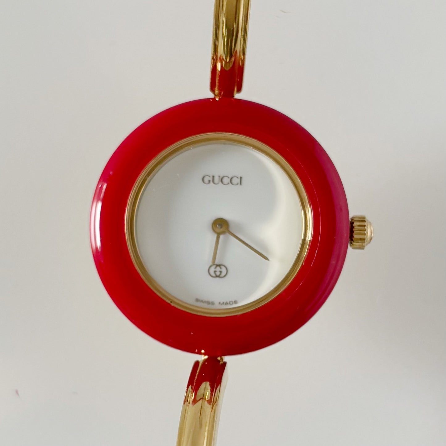 Gucci 1990s Interchangeable Bezel Gold Plated Bangle Watch with 12 bezels, case
