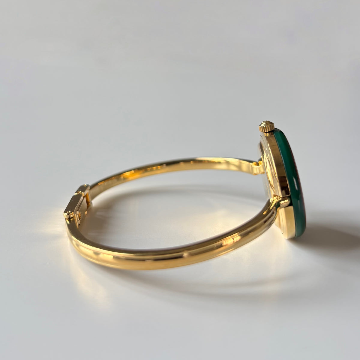 Gucci 1990s Interchangeable Bezel Gold Plated Bangle Watch with 12 bezels, case