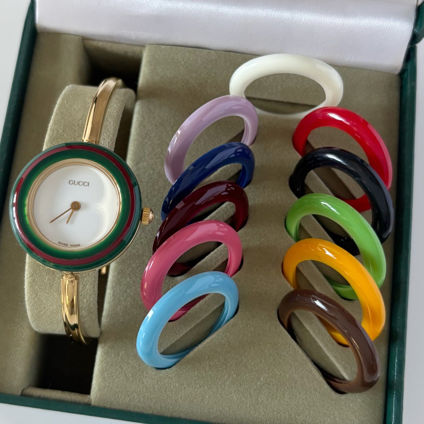 Gucci 1990s Interchangeable Bezel Gold Plated Bangle Watch with 12 bezels, case