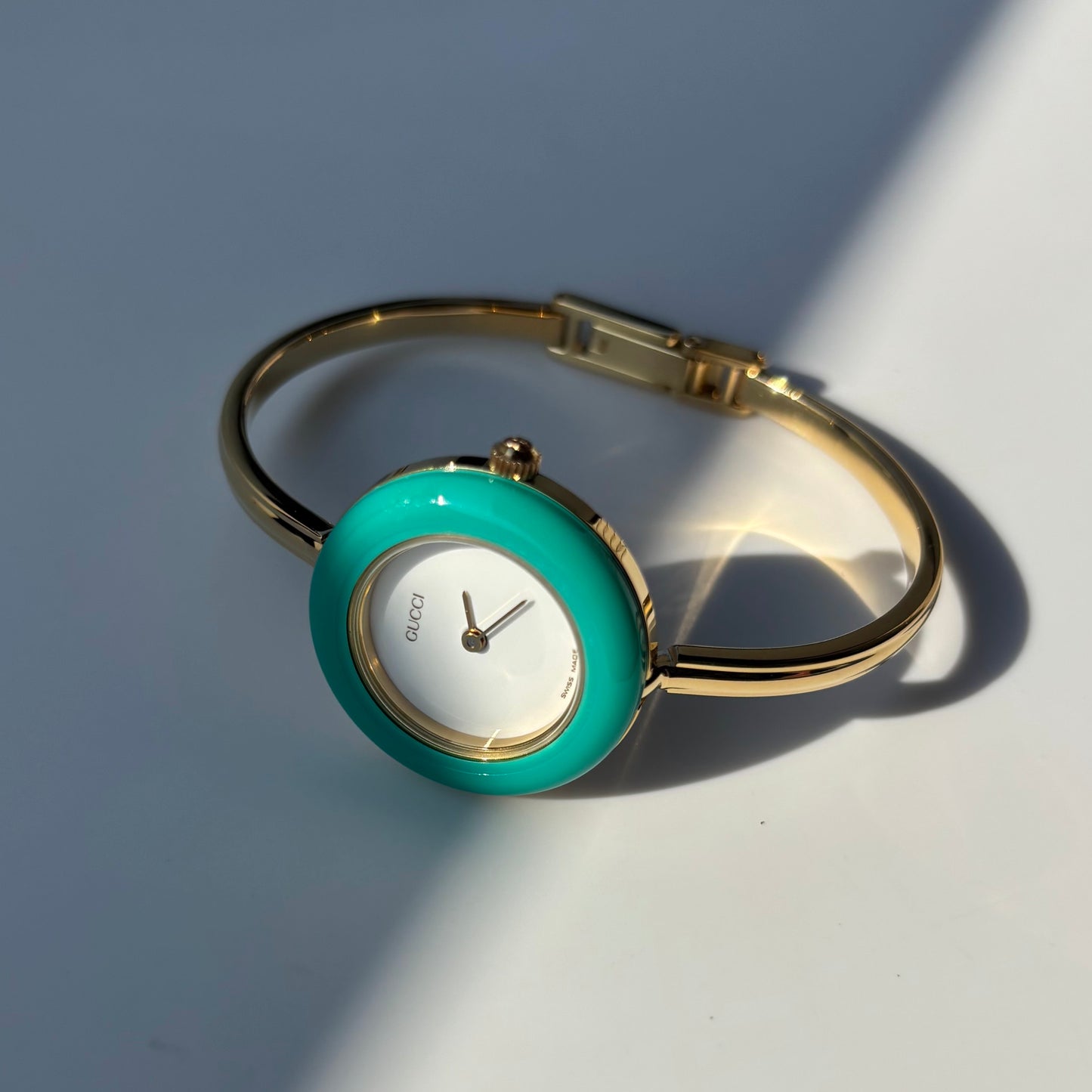 Gucci 1990s Interchangeable Bezel Gold Plated Bangle Watch with 12 bezels, case