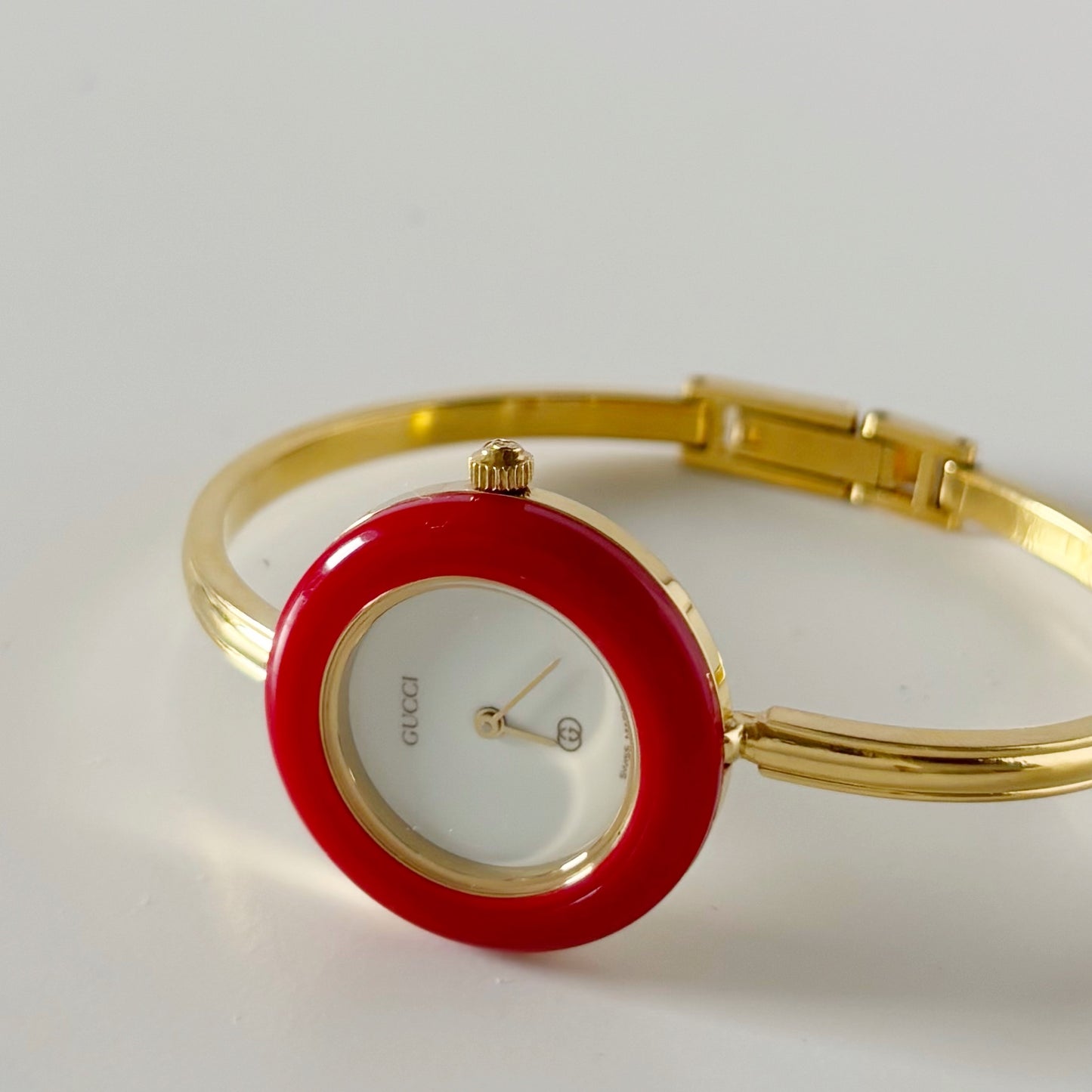 Gucci 1990s Interchangeable Bezel Gold Plated Bangle Watch with 12 bezels, case