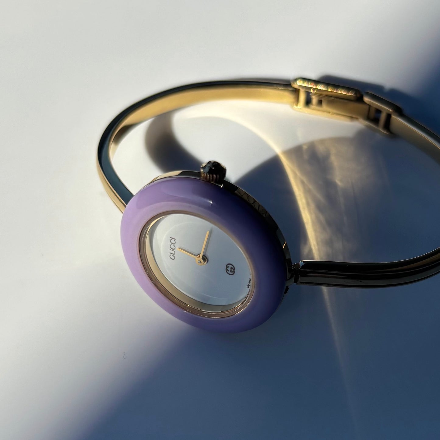 Gucci 1990s Interchangeable Bezel Gold Plated Bangle Watch with 12 bezels, case