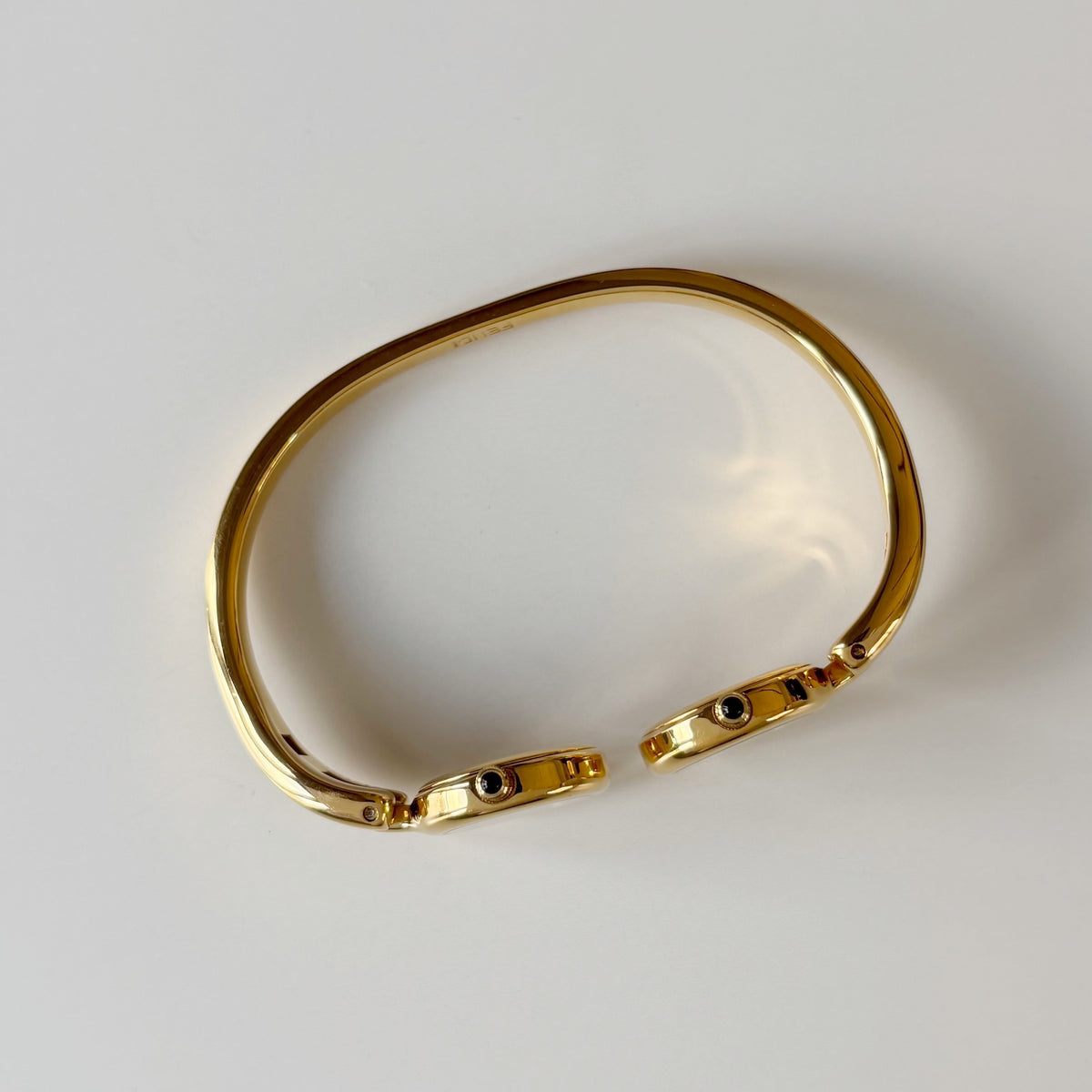 Fendi 1990s Seashell Dial Two Time Zone Gold Plated Bangle Watch