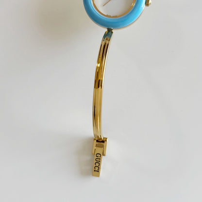 Gucci 1990s Interchangeable Bezel Gold Plated Bangle Watch with 12 bezels, case