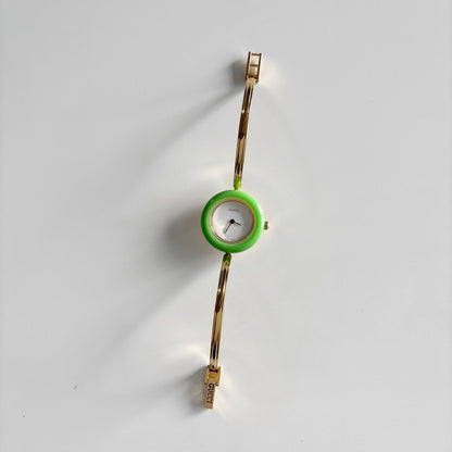 Gucci 1990s Interchangeable Bezel Gold Plated Bangle Watch with 12 bezels, case