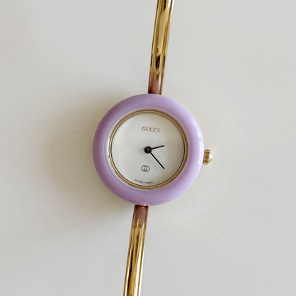 Gucci 1990s Interchangeable Bezel Gold Plated Bangle Watch with 12 bezels, case