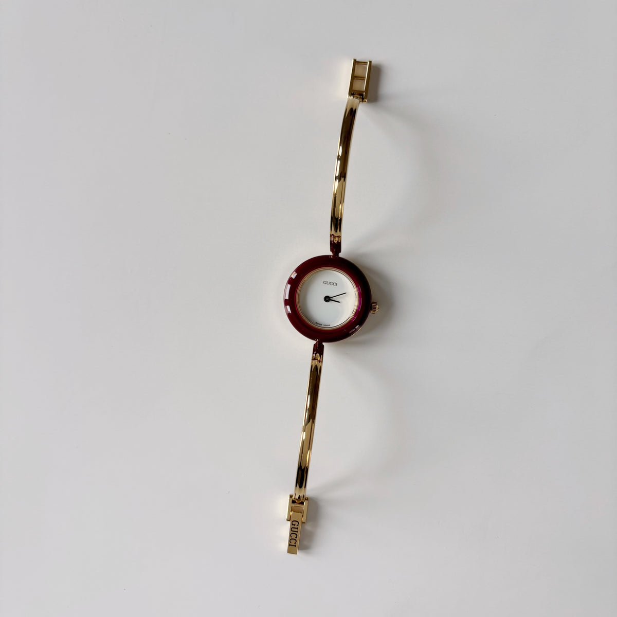 Gucci 1990s Interchangeable Bezel Gold Plated Bangle Watch with 12 bezels, case