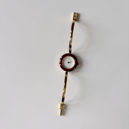 Gucci 1990s Interchangeable Bezel Gold Plated Bangle Watch with 12 bezels, case