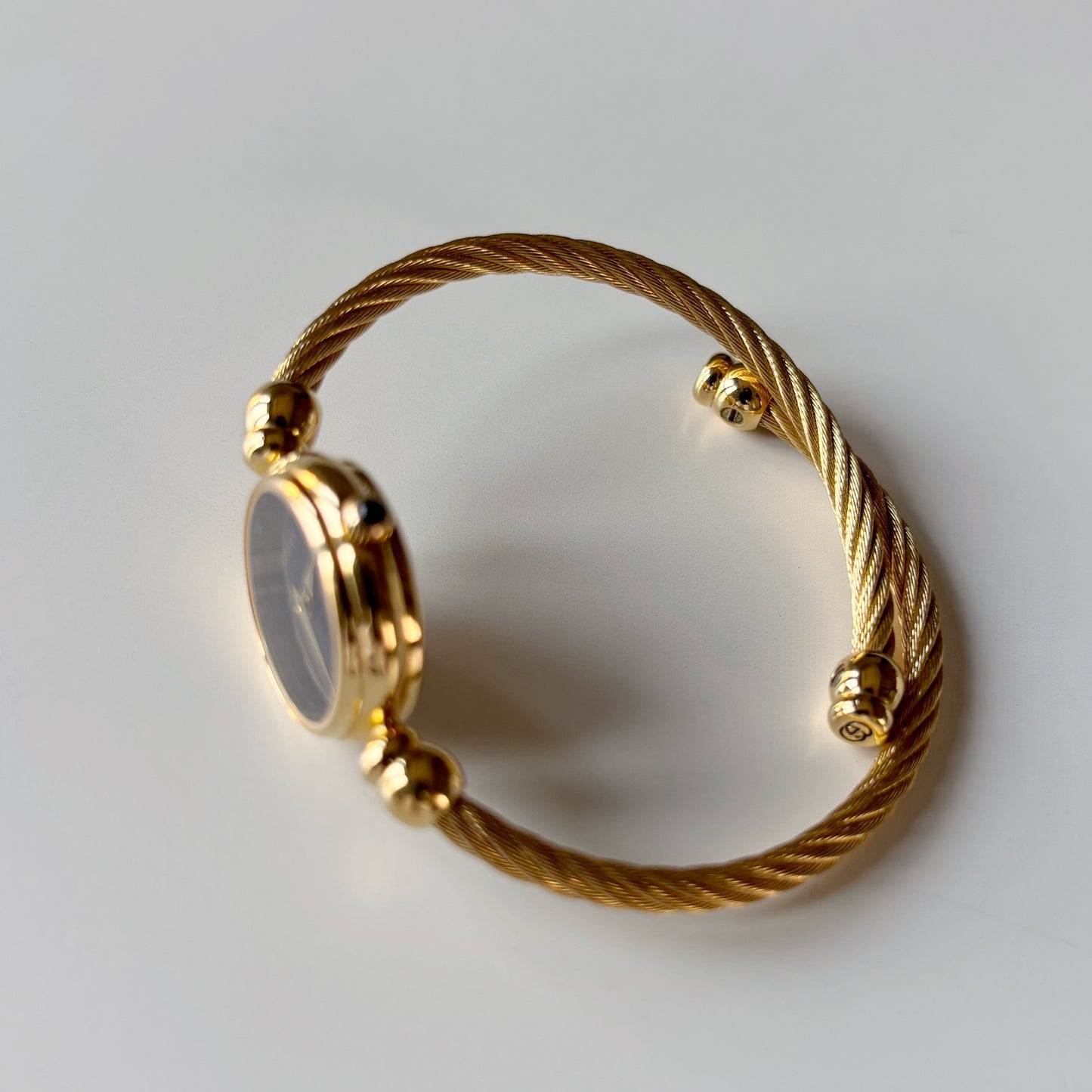 Gucci 1990s Black Dial Gold Plated Cable Bangle Watch